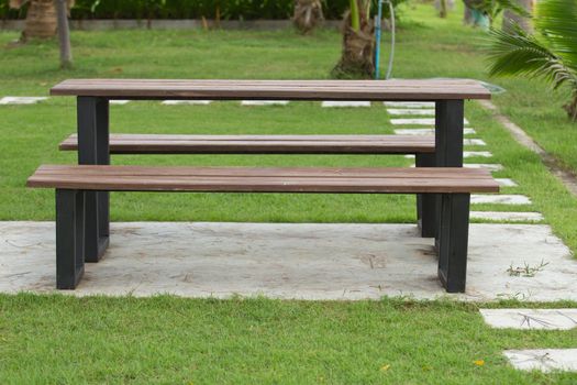The bench is made of solid wood set in beautiful gardens