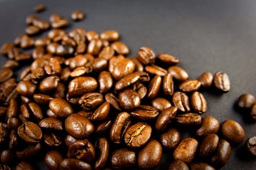 Coffee beans background.
Selective focus. 