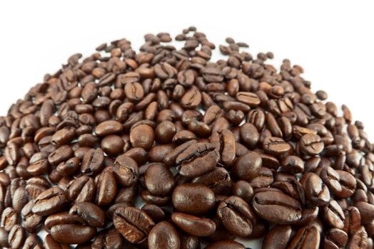 Coffee beans on a white studio background.
Selective focus. 