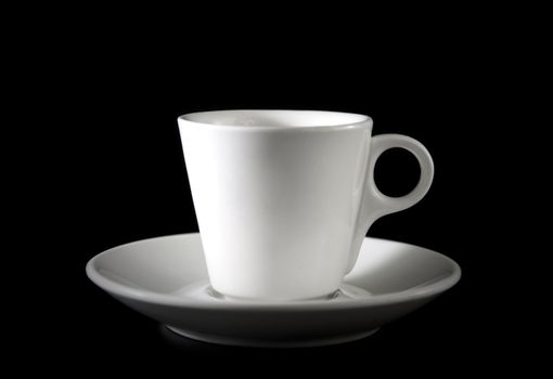 coffee white cup and saucer isolated on a black background