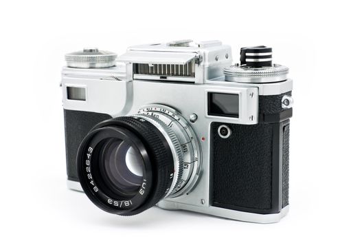 Isolated vintage classic manual film camera on white background.