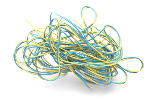 Blue and yellow wires closeup on white