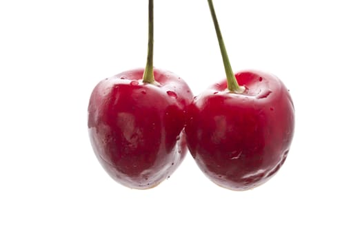 Fresh red cherry isolated on white background