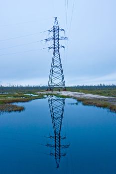 High voltage tower on a background of the sky