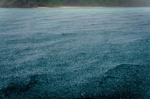 Detail of raindrops on the ocean waves during the storm