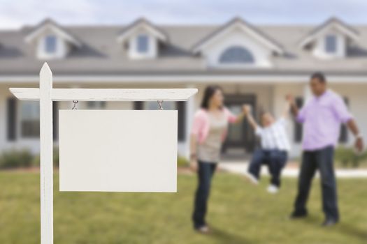 Blank Real Estate Sign and Playful Hispanic Family in Front of House.