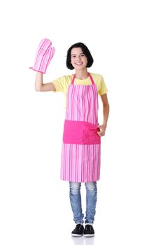 Young housewife in pink apron ang glove, isolated on white