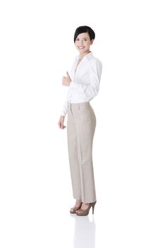 Happy smiling business woman with thumb up gesture. Isolated on white.