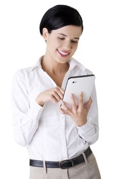 Business woman holding tablet computer with touchpad. Isolated on white.