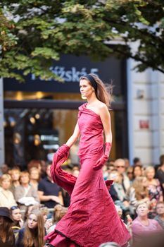 PRAGUE-SEPTEMBER 24: A model walks the runway during the 2011 autumn/winter Czech designers collection during the Prague Fashion Weekend on September 24, 2011 in Prague, Czech Republic.