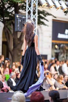 PRAGUE-SEPTEMBER 24: A model walks the runway during the 2011 autumn/winter Czech designers collection during the Prague Fashion Weekend on September 24, 2011 in Prague, Czech Republic.