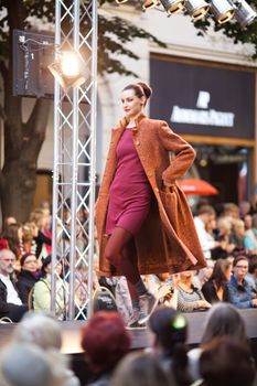 PRAGUE-SEPTEMBER 24: A model walks the runway during the 2011 autumn/winter Czech designers collection during the Prague Fashion Weekend on September 24, 2011 in Prague, Czech Republic.