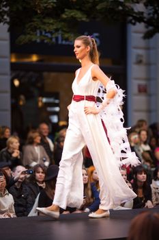 PRAGUE-SEPTEMBER 24: A model walks the runway during the 2011 autumn/winter Czech designers collection during the Prague Fashion Weekend on September 24, 2011 in Prague, Czech Republic.