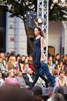 PRAGUE-SEPTEMBER 24: A model walks the runway during the 2011 autumn/winter Czech designers collection during the Prague Fashion Weekend on September 24, 2011 in Prague, Czech Republic.