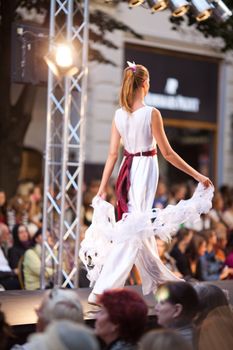 PRAGUE-SEPTEMBER 24: A model walks the runway during the 2011 autumn/winter Czech designers collection during the Prague Fashion Weekend on September 24, 2011 in Prague, Czech Republic.