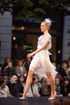 PRAGUE-SEPTEMBER 24: A model walks the runway during the 2011 autumn/winter Czech designers collection during the Prague Fashion Weekend on September 24, 2011 in Prague, Czech Republic.