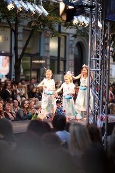 PRAGUE-SEPTEMBER 24: A children model walks the runway during the 2011 autumn/winter Czech designers collection during the Prague Fashion Weekend on September 24, 2011 in Prague, Czech Republic.