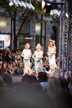 PRAGUE-SEPTEMBER 24: A children model walks the runway during the 2011 autumn/winter Czech designers collection during the Prague Fashion Weekend on September 24, 2011 in Prague, Czech Republic.