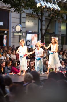 PRAGUE-SEPTEMBER 24: A children model walks the runway during the 2011 autumn/winter Czech designers collection during the Prague Fashion Weekend on September 24, 2011 in Prague, Czech Republic.