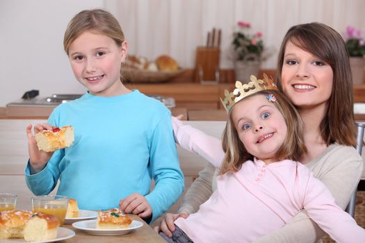 Children eating a French 'galette de rois'