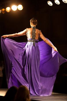 PRAGUE-SEPTEMBER 24: A model walks the runway during the 2011 autumn/winter Nina Ricci Paris Collection by Obsession during the Prague Fashion Weekend on September 24, 2011 in Prague, Czech Republic.