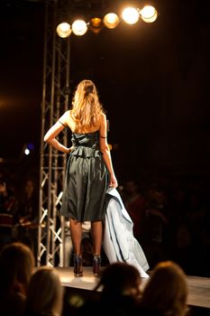 PRAGUE-SEPTEMBER 24: A model walks the runway during the 2011 autumn/winter Nina Ricci Paris Collection by Obsession during the Prague Fashion Weekend on September 24, 2011 in Prague, Czech Republic.