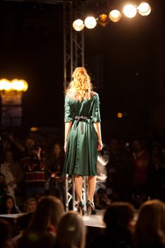 PRAGUE-SEPTEMBER 24: A model walks the runway during the 2011 autumn/winter Nina Ricci Paris Collection by Obsession during the Prague Fashion Weekend on September 24, 2011 in Prague, Czech Republic.