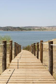 Wooden walkway serving Amieira pier on the banks of the reservoir of Alqueva, Alentejo, Portugal