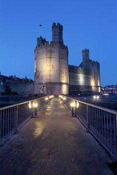 Medievil Caernarfon castle at twilight in north Wales 