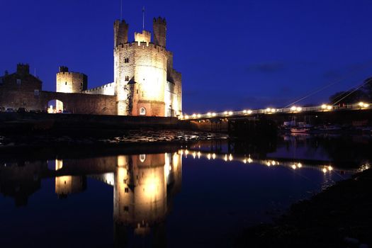 Medievil Caernarfon castle at twilight in north Wales 