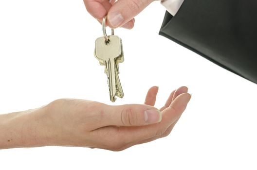 Man handing house keys over to a new owner. Isolated over white background.