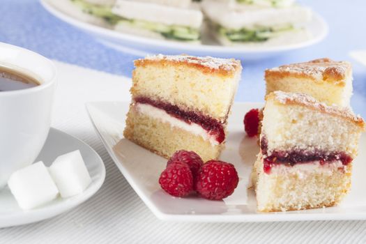 Victoria sponge cake with raspberries for afternoon tea.
