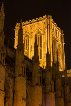 YORK, UK - MARCH 30: Detail of the Central Tower of York Minster illuminated at night. The Minster dates back from 1291 March 30, 2013 in York.
