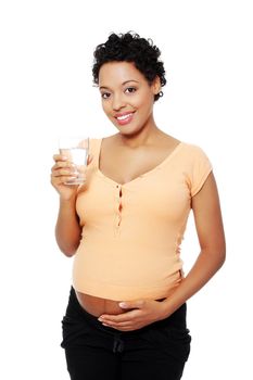 Pregnant woman with glass of water , isolated on white
