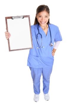 Medical nurse woman or doctor showing clipboard sign standing in full body length smiling happy in blue scrubs isolated on white background in studio. Multicultural female Asian medical professional.