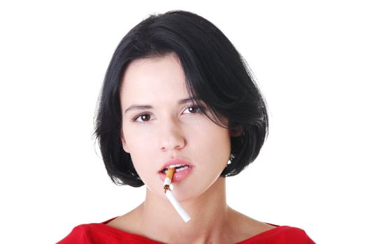 Young woman with broken cigarette. Stop smoking concept.