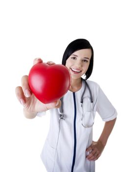 Female doctor holding red heart in hand. Isolated on white background