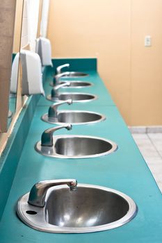 Line of sinks in a public restroom