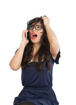 Woman in glasses emotionally speaks on a mobile phone