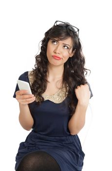 Woman in glasses emotionally speaks on a mobile phone