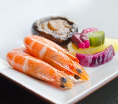 close up  boiled  prawns  with mushroom and  pickled vegetable  on white dish, asian cuisine
