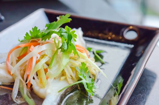 steamed white fish with  vegetable  on dish