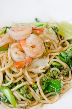 close up of Spaghetti with spicy prawn on white dish