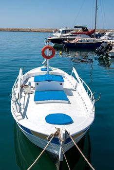 Greek fishing boat moored in the port city of Chania. Crete.