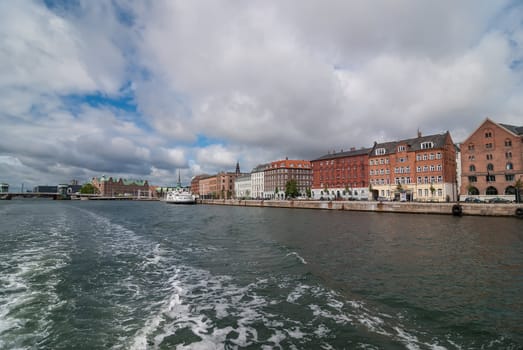 Copenhagen drawbridge. Walking through the channel of the old town.