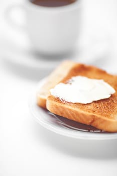 tea and toast with butter isolated on white