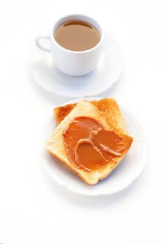 tea and toast with caramel isolated on white