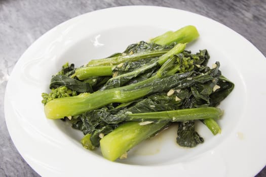 Steamed Chinese Kai Lan Green Vegetables with Garlic and Oil