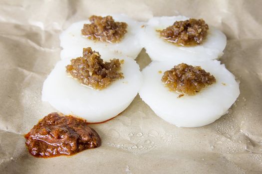 Singapore Chwee Kueh Steamed Water Rice Cake with Preserved Turnip and Chili Paste Closeup
