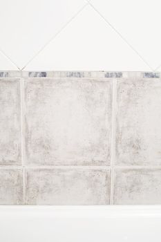 bath and a tile in the bathroom
